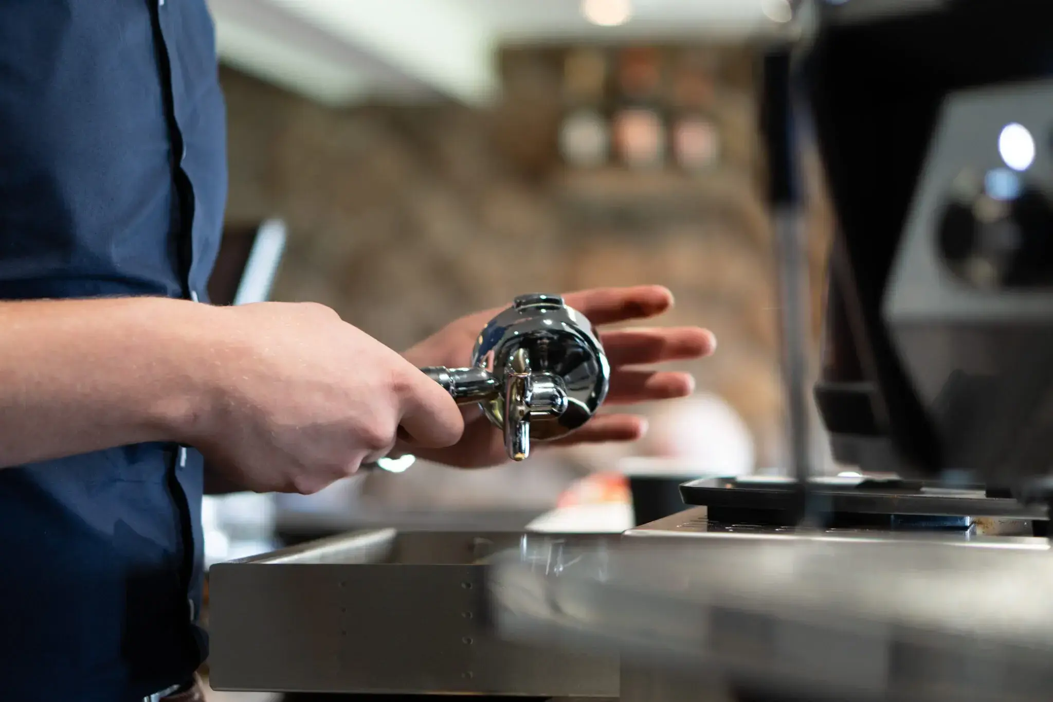 coffee tamper being prepared for use