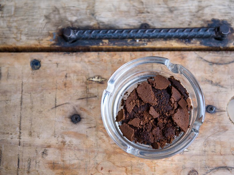 Glass jar of coffee grounds