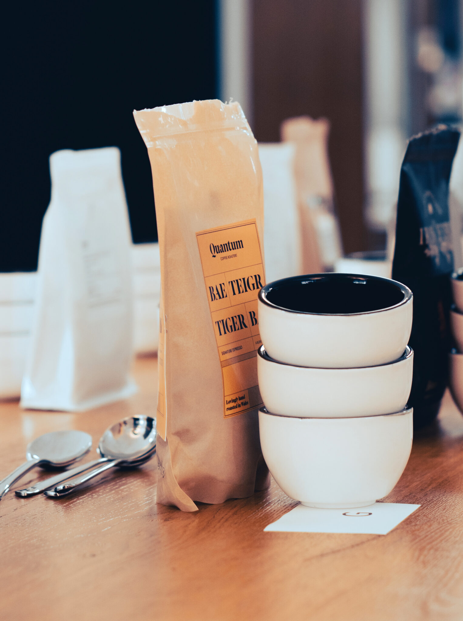 A bag of coffee beans roasted in Wales by Quantum Coffee Roasters ready to be tasted